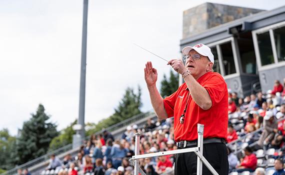 An image of Art Himmelberger conducting the band. 