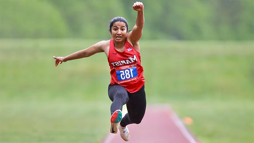 Image of Kiana Pathirana ’25 competing in the triple jump.